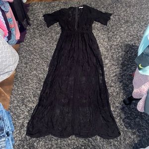 slits on both side of legs, shorts underneath and has a very deep V neck